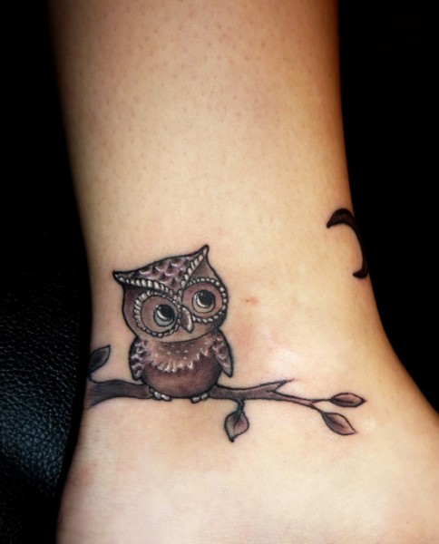 Татуировка сова на руке: значение и символика