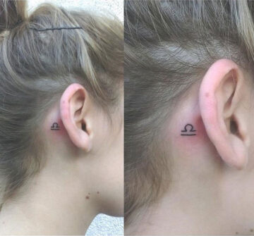 Символ Весов у девушки за ухом