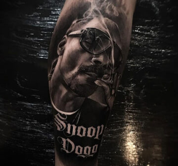 Snoop Dogg, мужская тату на голени